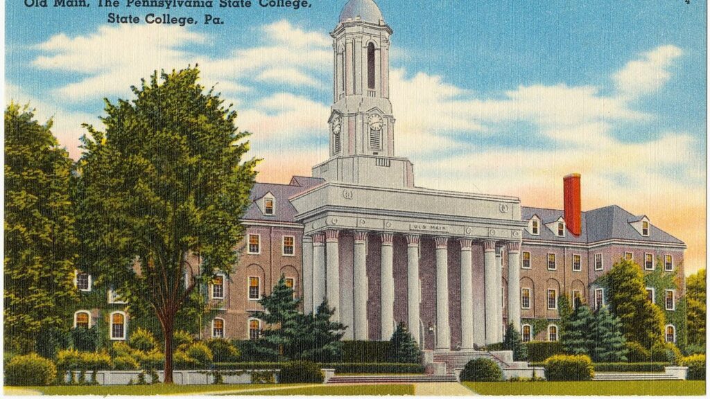 Color postcard of Old Main at the Pennsylvania State College, a columned building with a clock tower